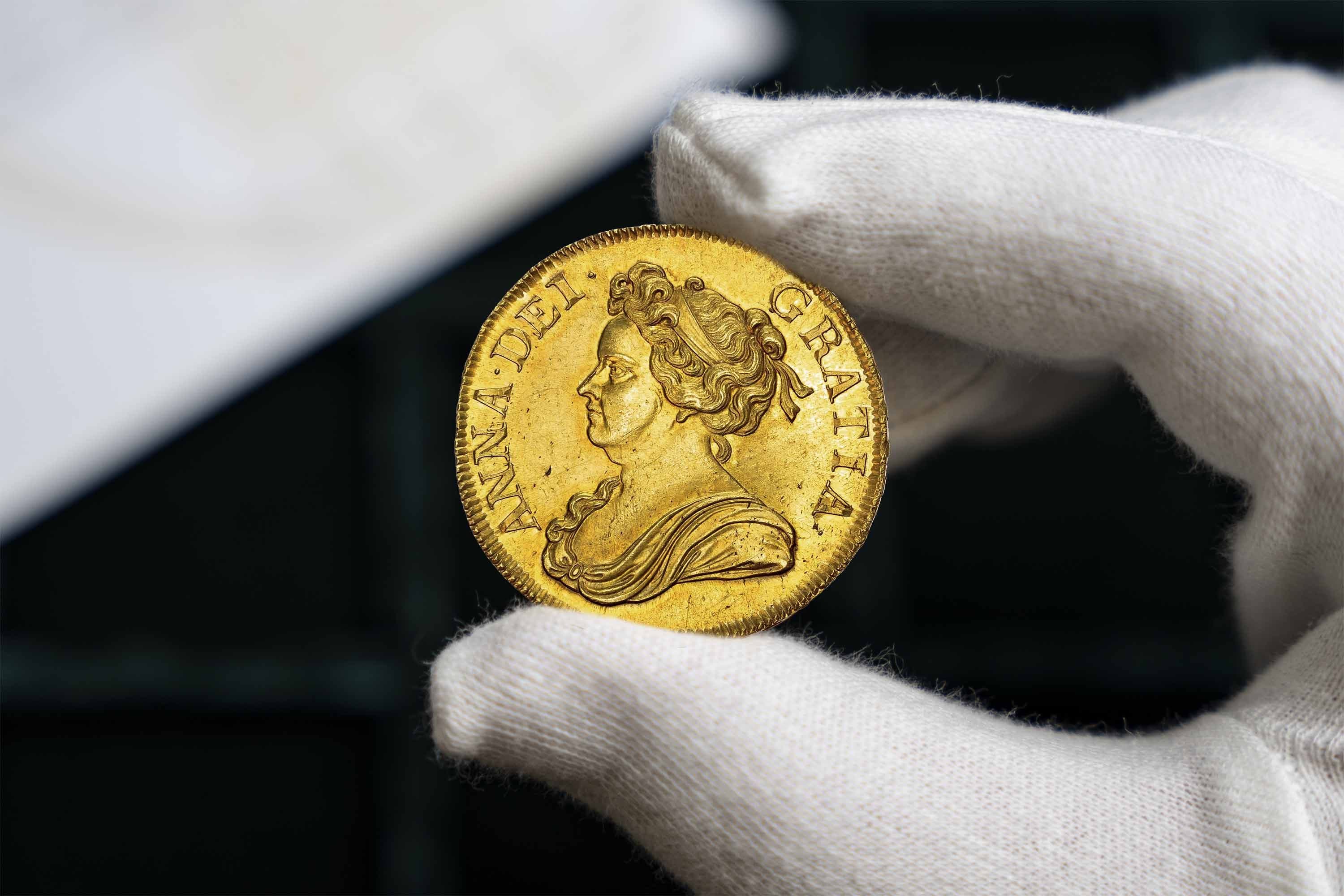 Anne (1702-1714), Post-Union, Five-Guineas, 1711, DECIMO, diademed and draped bust left, rev. crowned broader shields cr…